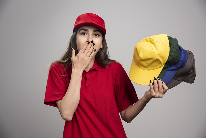 delivery woman with colorful caps covering her mouth delivery woman with colorful caps covering her mouth